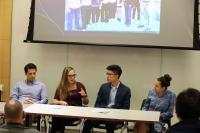 Four people sitting at a table